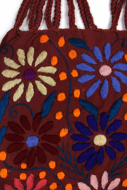 Bolso marrón con bordado floral