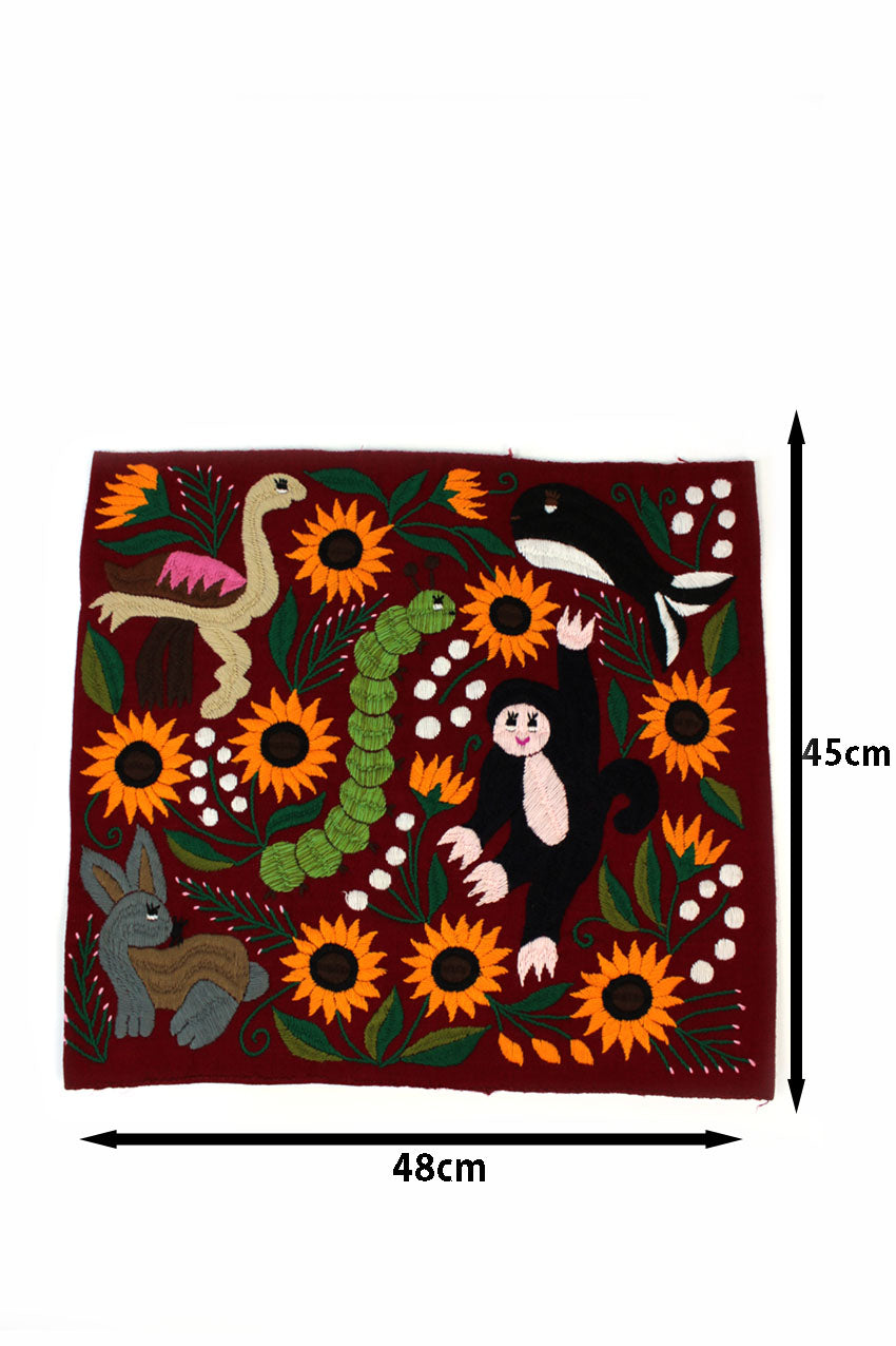 Cojín rojo con girasoles