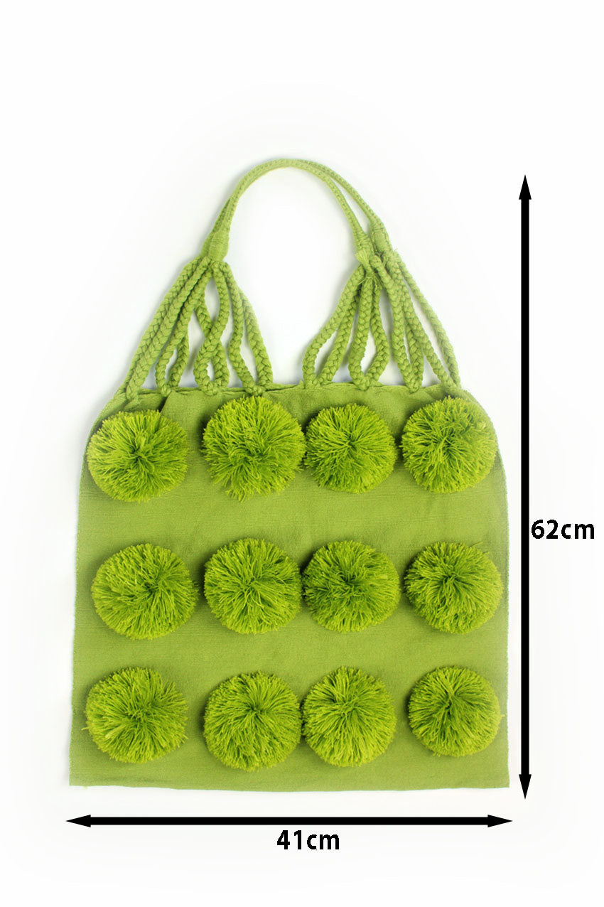 Bolsa de tela verde con pompones